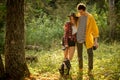 Young loving couple enjoying walking with afro dog Royalty Free Stock Photo