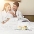 Young loving couple having breakfast in hotel room Royalty Free Stock Photo