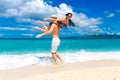 Young loving couple having fun in the tropical beach Royalty Free Stock Photo