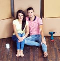 Young loving couple moving to a new house. Home and family concept. Royalty Free Stock Photo