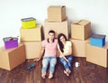 Young loving couple moving to a new house. Home and family concept. Royalty Free Stock Photo