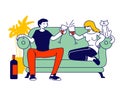 Young Loving Couple Spend Time at Home Sitting on Couch Together Chatting, Drinking Wine with Cat Sitting nearby