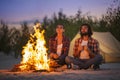 Couple Camping Near Campfire Royalty Free Stock Photo