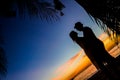 Young loving couple on wedding day on tropical beach and sunset Royalty Free Stock Photo