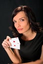 Young lucky gambler with cards