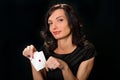 Young lucky gambler with cards