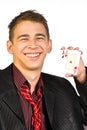 Young lucky gambler with cards