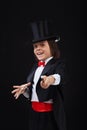 Young magician boy using his magic wand Royalty Free Stock Photo