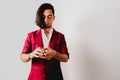 Young magician juggling a deck of playing cards