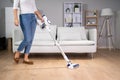 Young Maid Cleaning Floor Royalty Free Stock Photo