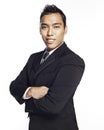 Young Malay man in black suit and confident smile