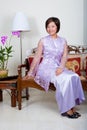 Young Malay woman in pink baju kurung, Royalty Free Stock Photo