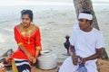 Young maldivian couple dressed in national clothes cooking lunch Royalty Free Stock Photo