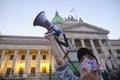 Young male activist using a megaphone to speak about the climate emergency