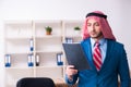 Young male arab employee working in office Royalty Free Stock Photo