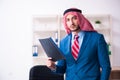 Young male arab employee working in office Royalty Free Stock Photo