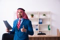 Young male arab employee working in office Royalty Free Stock Photo