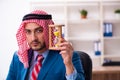 Young male arab employee working in office Royalty Free Stock Photo