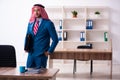 Young male arab employee working in office Royalty Free Stock Photo