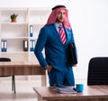 Young male arab employee working in office Royalty Free Stock Photo