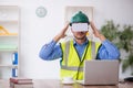 Young male architect wearing virtual glasses