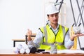 Young male architect working indoors Royalty Free Stock Photo