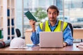 Young male architect working in the office Royalty Free Stock Photo