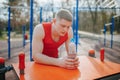 Young Male Athlete Rehydrating with Water Bottle Outdoors Royalty Free Stock Photo