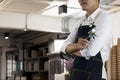 Young male Bartender in cafe restaurant. Royalty Free Stock Photo