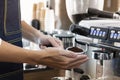 Young male Bartender in cafe restaurant. Royalty Free Stock Photo