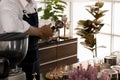 Young male Bartender in cafe restaurant. Royalty Free Stock Photo