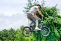 BMX freestyle teenage biker jumping horizontal Royalty Free Stock Photo