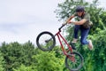 BMX freestyle teenage biker dangerous jump Royalty Free Stock Photo