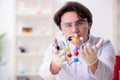 The young male biochemist working in the lab Royalty Free Stock Photo