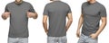 Young male in blank gray t-shirt, front and back view, isolated white background. Design men tshirt template and mockup for print Royalty Free Stock Photo