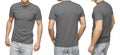 Young male in blank gray t-shirt, front and back view, isolated white background . Design men tshirt template and mockup for print