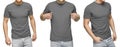 Young male in blank gray t-shirt, front and back view, isolated white background . Design men tshirt template and mockup for print Royalty Free Stock Photo