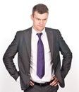 Young male business executive thinking on white Royalty Free Stock Photo
