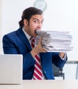 Young male businessman sitting in the office Royalty Free Stock Photo