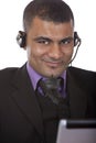 Young male call center agent with headset Royalty Free Stock Photo
