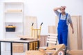 Young male carpenter working indoors Royalty Free Stock Photo