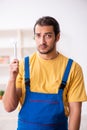 Young male carpenter working indoors Royalty Free Stock Photo