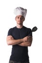 Young Male Chef in Black Shirt and White Hat Royalty Free Stock Photo