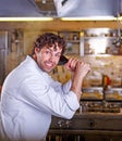 Chef fighting in the kitchen. Cooking process concept. Royalty Free Stock Photo