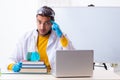 Young male chemist student preparing for exam Royalty Free Stock Photo