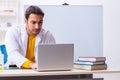 Young male chemist student preparing for exam Royalty Free Stock Photo