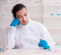 Young male chemist working in the lab Royalty Free Stock Photo