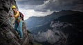 Pretty, female climber on a via ferrata Royalty Free Stock Photo