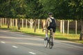 Young male cyclist riding a road bike in summer day. Action, motion concept Royalty Free Stock Photo