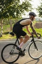 Young male cyclist riding a road bike in summer day. Action, motion concept Royalty Free Stock Photo